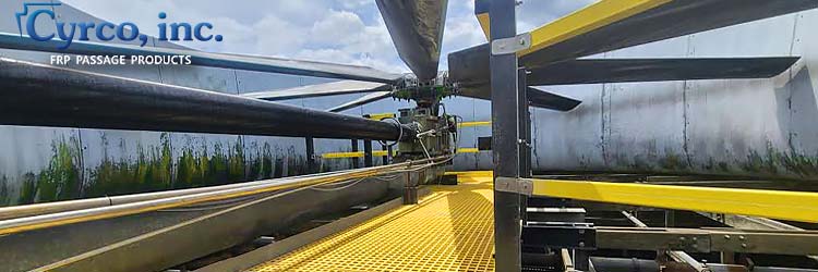 Custom Designed and Fabricated FRP Walkway Inside a Field Erected Cooling Tower's Fan Stack. Safe Mechanical Access to the Fan Assembly and Gearbox.