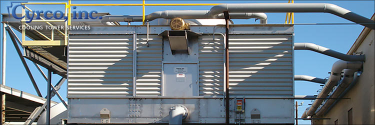 Factory Assembled Cooling Tower with FRP Wall Casing and FRP High Visibility Yellow Safety Railing. Custom Metal Fabricated Galvanized Steel Door which is more Ideal for Corrosive or Chloride Environments.
