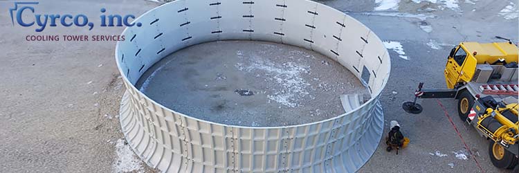 Exceptionally Large Diameter, New Replacement FRP Fan Stack Ready to Be Crane Hoisted to the Top of a Field Erected Cooling Tower