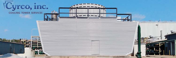 New Custom Constructed FRP Composites Field Erected Cooling Tower with Exterior FRP Wall Casing, FRP Fan Decking, FRP Square Tube Framing, FRP Fans and Fan Stack. Door Entry through the FRP Wall Paneling.